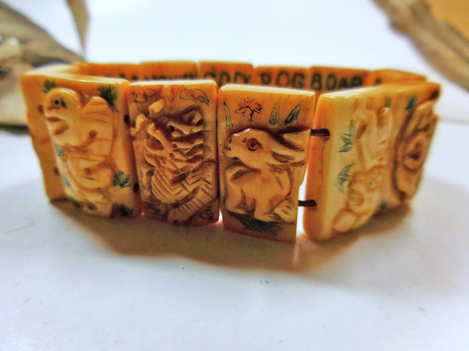 Sold at Auction: RARE MATERIAL CARVING 12 CHINESE ZODIAC BRACELET